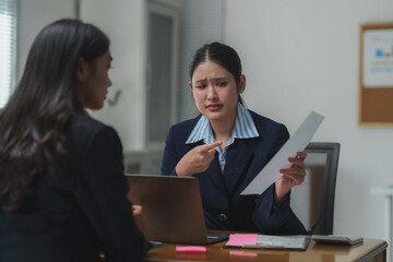 Businesswomen having a disagreement during a meeting in the office