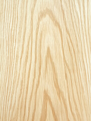 Naklejka premium Wood Grain Texture: Capturing the intricate patterns and warm tones of natural wood, ideal for adding a touch of organic elegance.