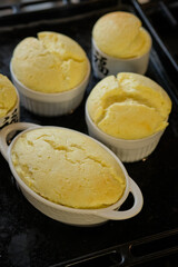 cottage cheese soufflé with berries. wooden background.