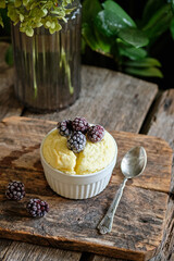 cottage cheese soufflé with berries. wooden background.