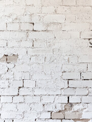 Fototapeta premium White Brick Wall Texture: A close-up shot showcases a weathered brick wall, each brick telling a story of time and texture, ideal for backgrounds and design assets.