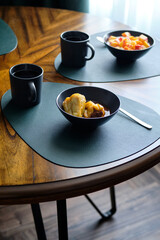 Peppers stuffed with ground beef and rice in tomato sauce.. Breakfast