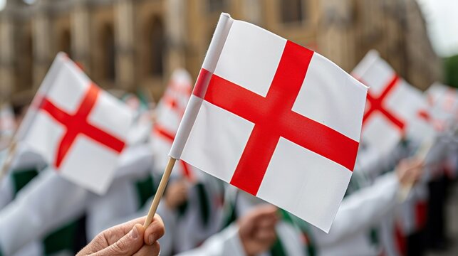 Waving saint george's cross flags at outdoor celebration event