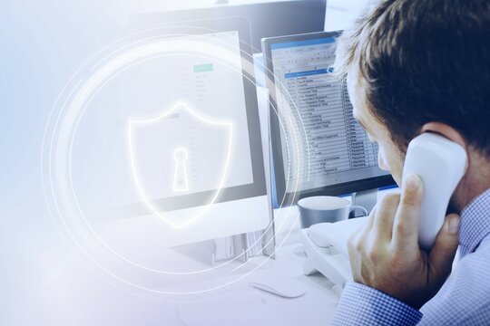 A man is writing an e-mail