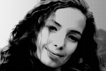 Portrait of a beautiful woman with curly hair