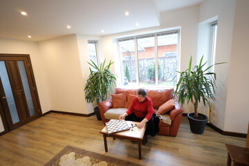 Fototapeta premium Grandmother and a grandson playing