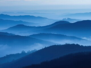 Fototapeta premium Blue Misty Mountain Range at Dawn