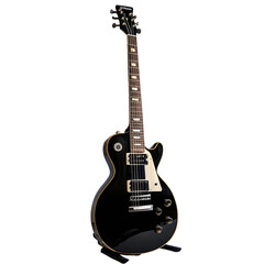 Fototapeta premium A glossy black electric guitar, likely a Les Paul style, is featured 