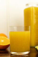 Healthy orange juice. A glass of juice on the table. Orange diet