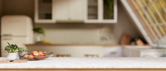 The marble counter with kitchenware in kitchen or dining room with natural light from roof window.