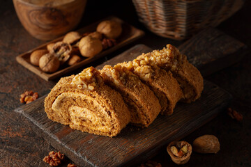 Walnut and buttercream roll: a traditional Oriental pastry.