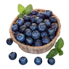Fresh Blueberries in a Woven Basket with Mint Leaves on a Transparent Background. A basket filled with ripe, juicy blueberries, accompanied by fresh mint leaves
