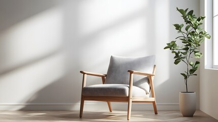 Fototapeta premium A Scandinavian-style reading chair with light wood armrests and a fabric cushion, placed against a clean backdrop