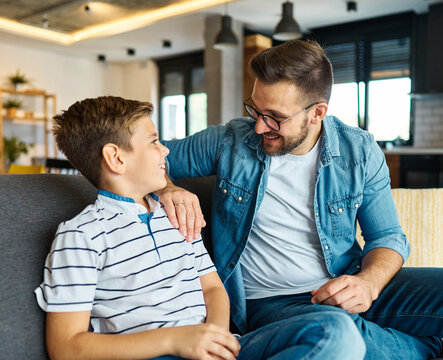 father son family man child portrait parent boy happy together teen love dad togetherness hugging male bonding care black home childhood teen teenager adolescence - Powered by Adobe