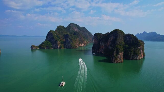 Travel trip on Phuket Thailand. Beautiful sunset landscape Hong tropical island and Phang Nga bay in turquoise sea, aerial view.