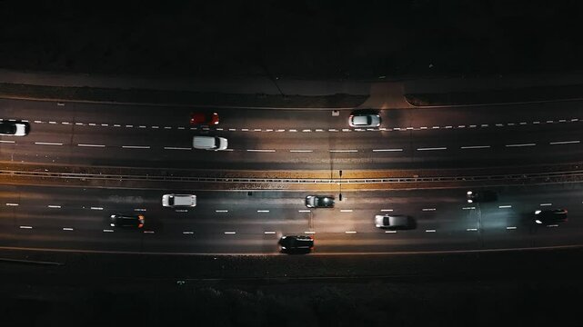 Busy A40 road in west London, aerial top-down shot at night