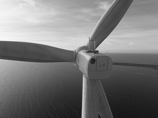Offshore wind turbines, close up view, winds and generate vast amounts of energy. Afsluitdijk, The...