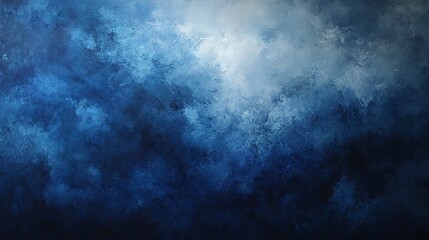 Obraz premium Dark stormy clouds in deep blue and grey tones, moody and atmospheric texture