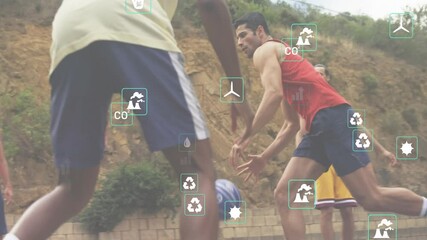 Playing outdoors, people with animation of environmental and energy icons overlayed - Powered by Adobe
