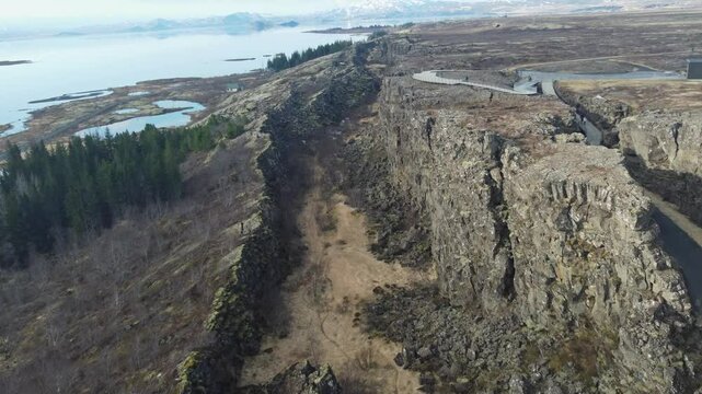 aerial footage of ground cracks at tectonic plate boundaries in iceland (thingvellir)