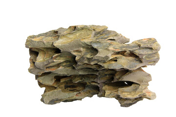 Layered dragon stone slab with dramatic ridges and cavities isolated on transparent background. PNG...