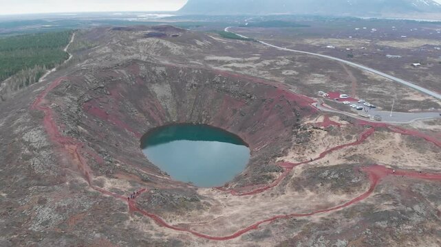 aerial footage of kerid rainwater crater lake in iceland