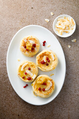 Homemade curd cakes with honey and coconut