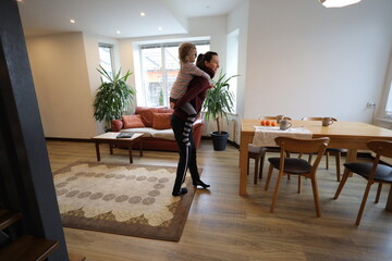 Mother and daughter kid indoors