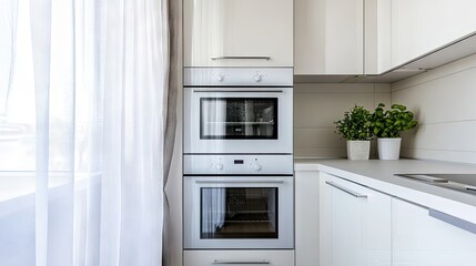 Fototapeta premium Modern and clutter-free kitchen with a white smart oven seamlessly blending in.