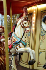 Closeup of a horse on a vintage carousel in an amusement park