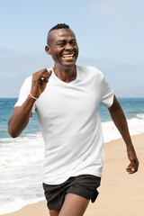 Png men's apparel t-shirt mockup summer fashion shoot at the beach