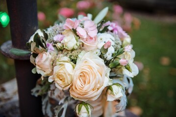 Elegant bouquet with cream and pink roses.