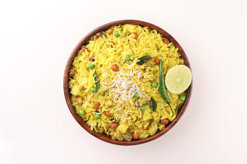 Indian Breakfast Dish Poha Also Know as Pohe or Aalu poha made up of Beaten Rice or Flattened Rice. The rice flakes are lightly fried in oil with mustard, chilly, onion, curry leaves and turmeric   

