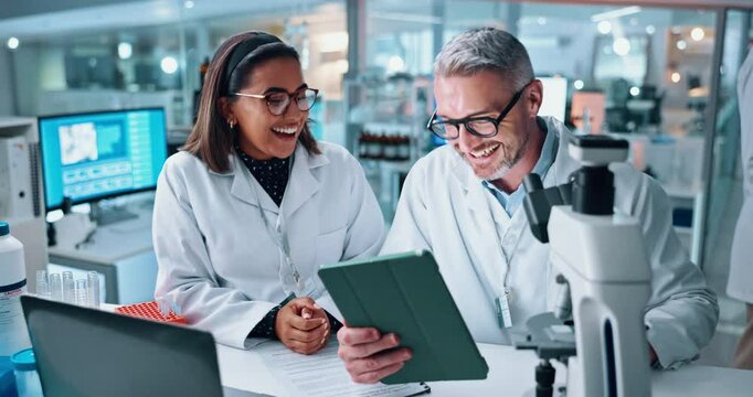 Scientist, people and high five with tablet, microscope and teamwork for medical research. Biotech, laboratory and mentor with assistant in celebration for pharmaceutical success, data or achievement
