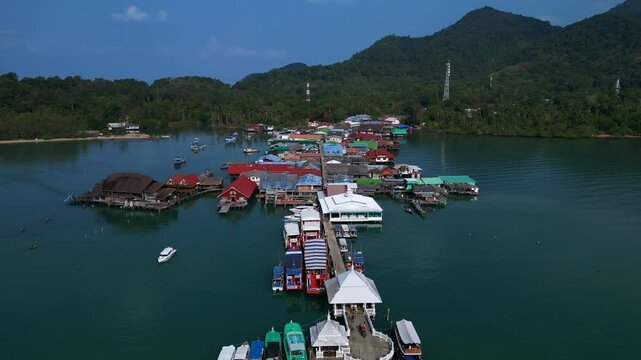 floating village on island colorful houses. Marvelous aerial view flight drone