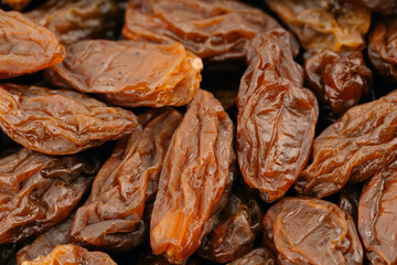 Raisins on a white background. Dried grapes.