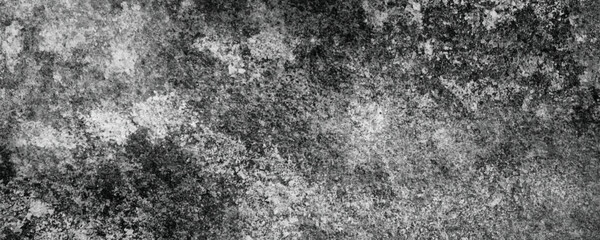 A Dark and Dramatic Abstract Texture on a Rough and Gritty Concrete Surface

