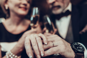 close up photo of Couple hold hands and Relax