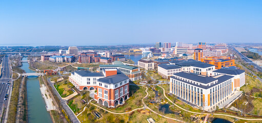Fototapeta premium Aerial view of financial buildings and beautiful lake In Shanghai.