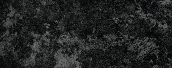 A Heavy and Dramatic Aesthetic Created by the Dark and Worn Surface of an Aged Wall

