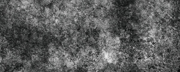 The Unique and Abstract Patterns Created by the Natural Erosion of a Cement Surface

