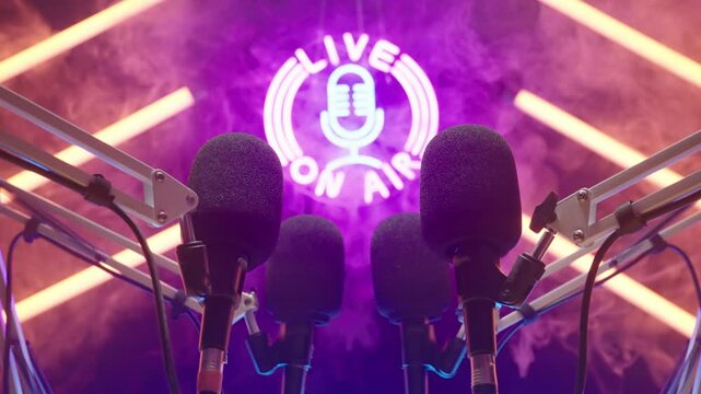 Live On Air Podcast Studio with Orange and Pink Neon Lights in Smoke 4K