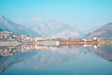 Fototapeta premium Scenic View of Lago di Annone with Monte Resegone and Civate in the Background