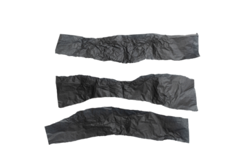 Wrinkled or crumpled black paper texture used as a background texture in a design.