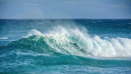 Fototapeta premium ocean wave crashing with vibrant blue colors 
