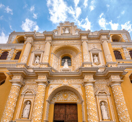 The magnificent yellow and white facade of the church of La Merced (Iglesia de la Merced), Antigua, Guatemala