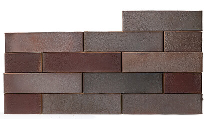 Stacked red and brown bricks with textured surface isolated on white background