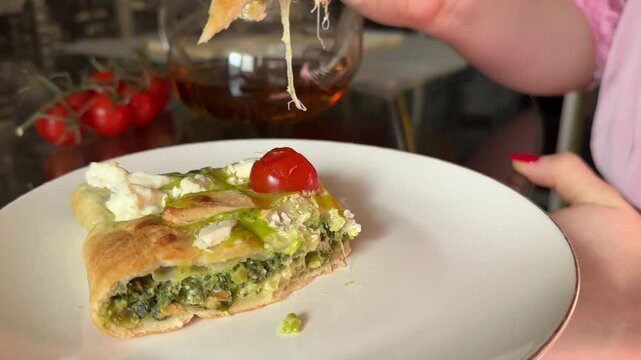 delicious cheese spinach pie girl with red nails eating breakfast green cheese spinach food health nutrition
