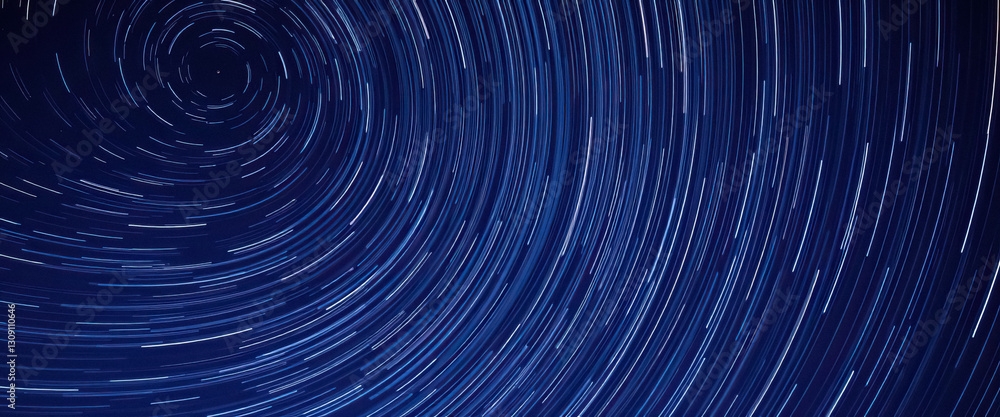 Aufkleber Swirling celestial patterns capture extended exposure of stars mesmerizing star trail effect