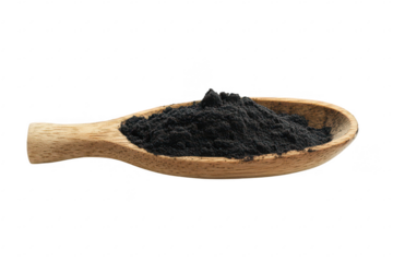 Black maca organic powder in wooden sppon isolated on transparent background